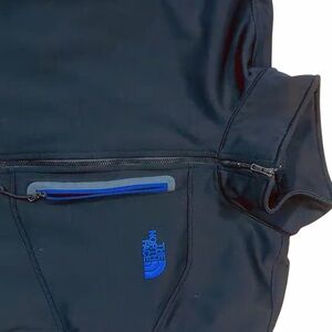 The North Face Black Jacket with Blue and Gray Logo and Zip